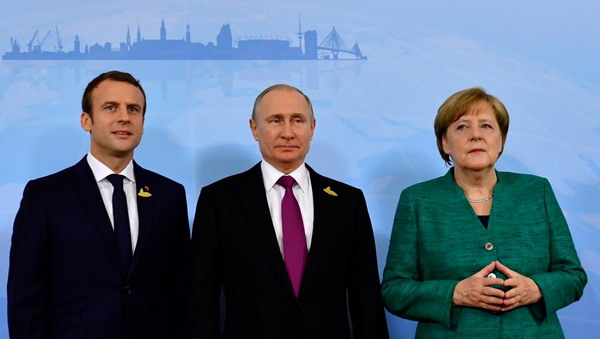 Ситуация на востоке Украины обсуждена на трехсторонней встрече Меркель, Макрона и Путина