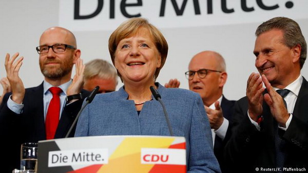 «Немецкая Ямайка»: партия Ангелы Меркель сформирует правящую коалицию