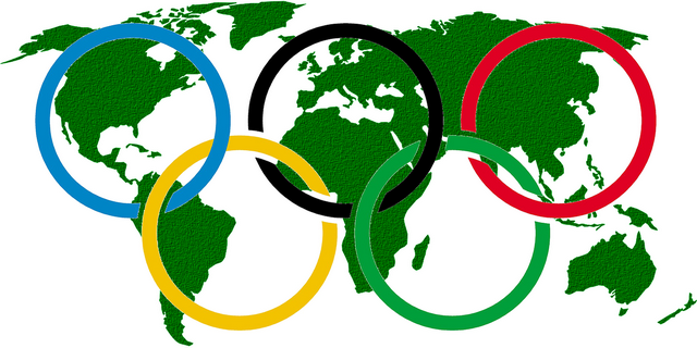 Какова цель изменения олимпийского девиза?
